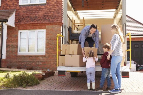 Local removals professionals handling a small office relocation
