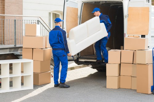 Staff member reviewing safety procedures inside a storage facility