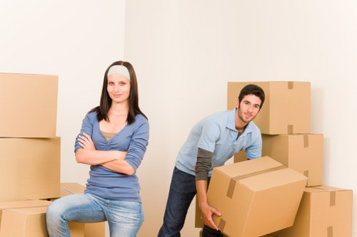 Stacked office furniture stored safely in Stmarycray