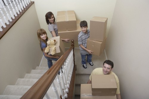 Experienced movers loading furniture for a St Mary Cray flat move